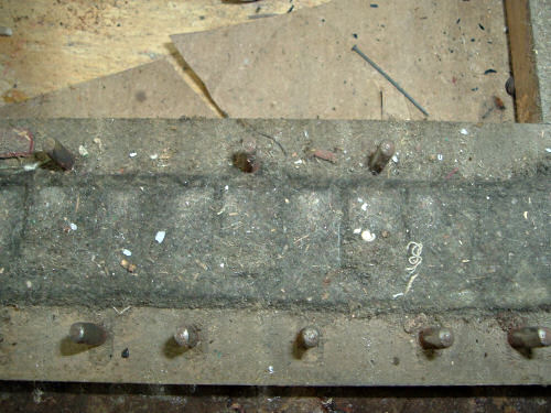The Key Frame of a Reed Organ Undergoing Restoration